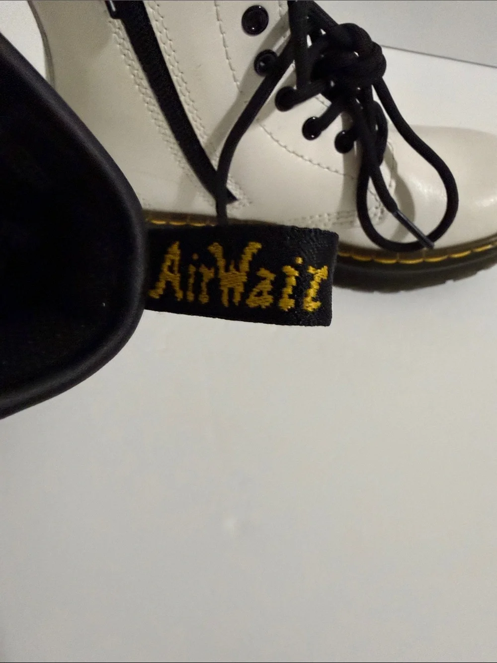 Dr. Martens Kids White Leather Ankle Boots with Black Accents